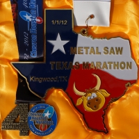 2012 Texas Marathon Medal vs. 2012 Houston Marathon Medal